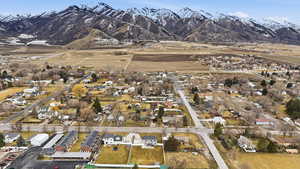 View of property location with nearby suburban area and a mountain backdrop