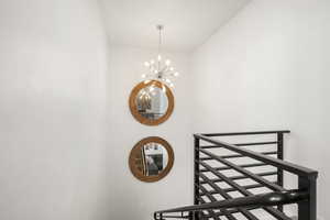 Stairs featuring hanging lights