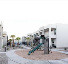 Community play area with a residential view