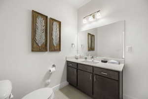 Bathroom featuring vanity and light tile patterned flooring