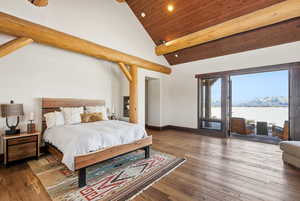 Bedroom featuring a mountain view, dark wood-style flooring, access to outside, a vaulted wood ceiling, and recessed lighting