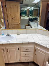 Full bathroom featuring double vanity