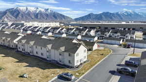 Aerial view of residential area featuring mountains