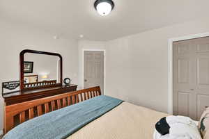 Bedroom featuring a textured ceiling