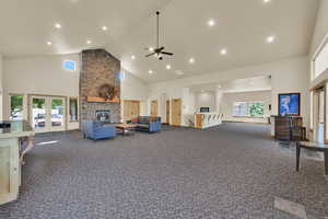 Common area featuring a high ceiling and recessed lighting