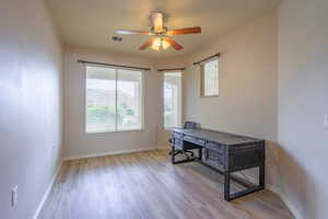 Den with LVP Flooring & Ceiling Fan