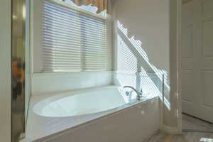 Full bath with a garden tub