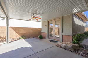 View of patio / terrace featuring french doors to detached casita and ceiling fan