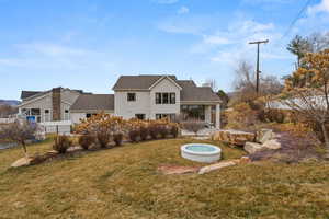 Rear view of property with a patio area, stucco siding, and a shingled roof