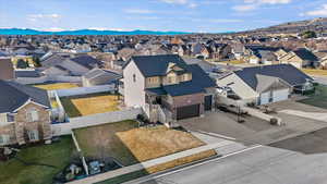 Aerial view of residential area with mountains