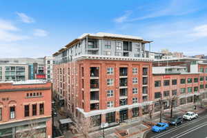 View of apartment building / complex with a city view