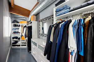 View of walk in closet, extra large