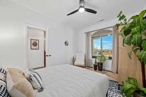 Bedroom featuring a ceiling fan