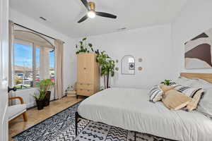 Bedroom featuring ceiling fan