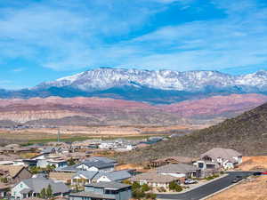 View of mountain backdrop with nearby suburban area
