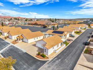 Aerial view of residential area featuring a mountainous background