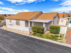View of front facade with stucco siding