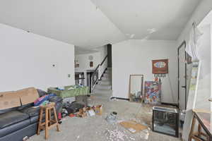 Living area featuring stairway