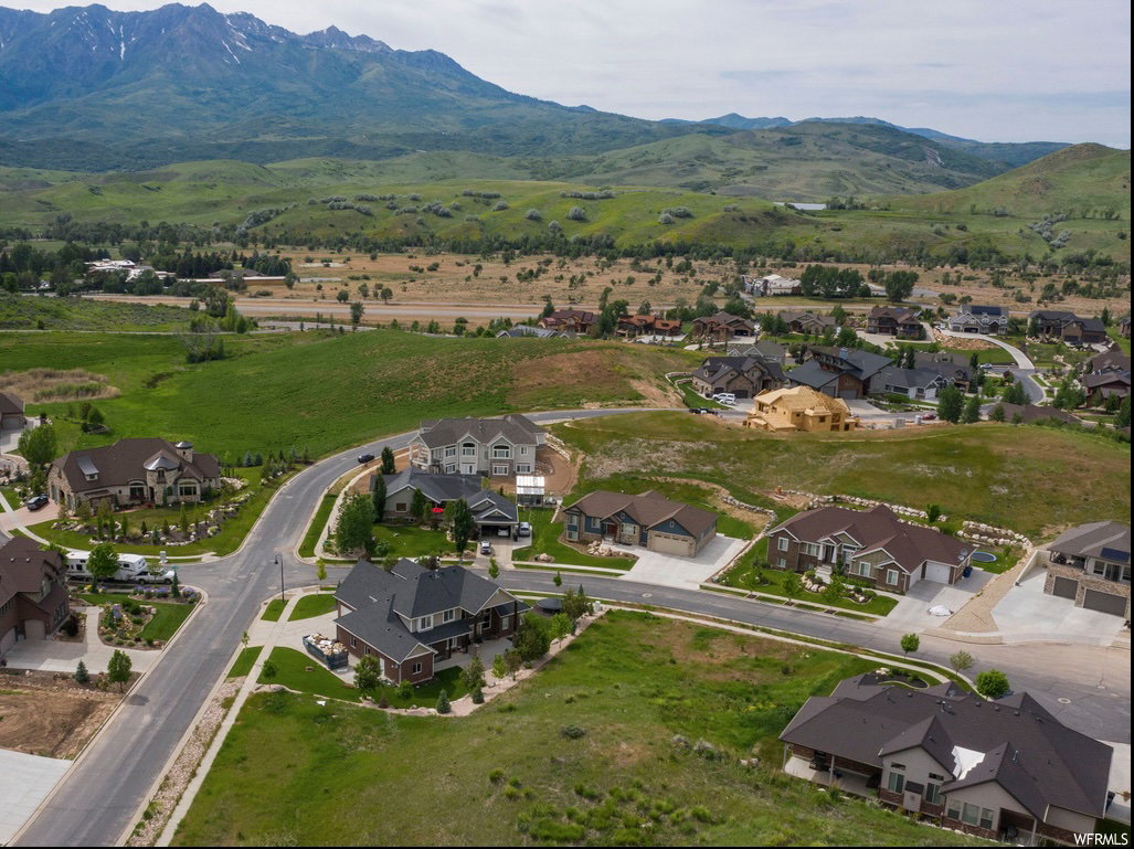 Aerial perspective of suburban area featuring mountains