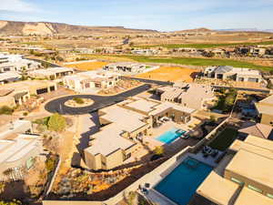 Aerial view of residential area featuring mountains