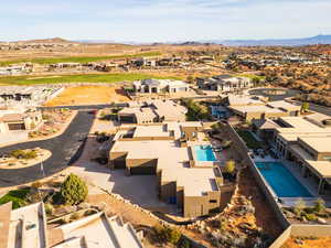 Aerial view of residential area featuring a mountainous background