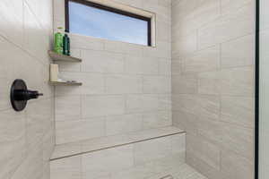 Bathroom with a tile shower