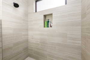 Bathroom with tiled shower