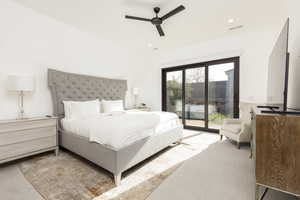 Carpeted bedroom featuring access to exterior, ceiling fan, and recessed lighting