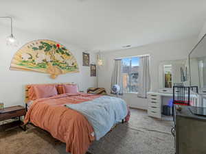 View of carpeted bedroom