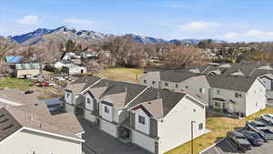 Aerial view of residential area with a mountainous background