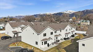 Aerial perspective of suburban area with mountains
