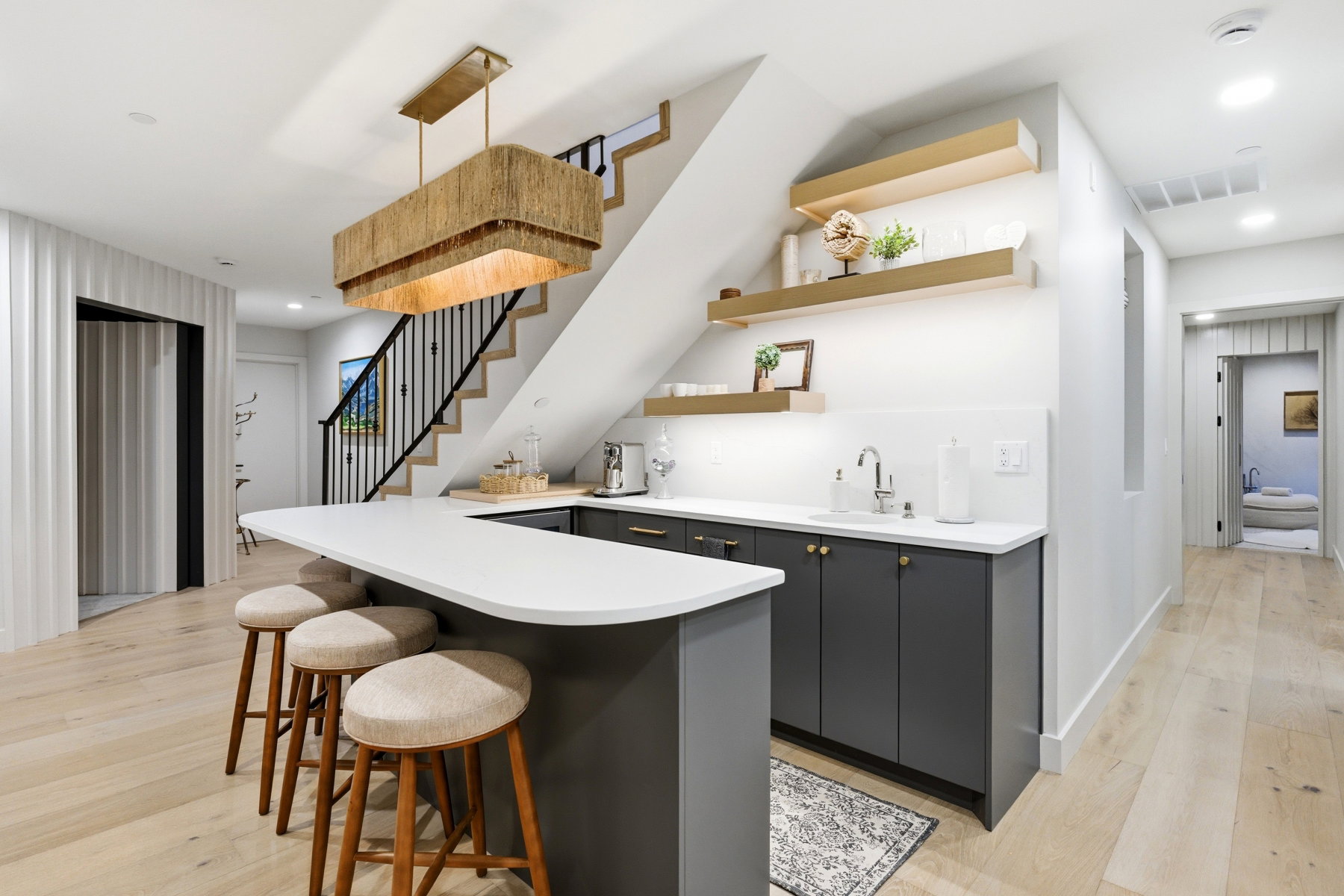 Bar area featuring light countertops, open shelves, recessed lighting, light wood-type flooring, and gray cabinets