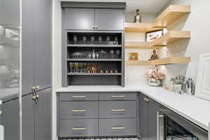 Pantry featuring beverage cooler