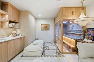 Bedroom with recessed lighting and a sauna / steam room
