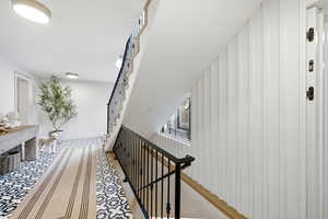 Stairs featuring baseboards