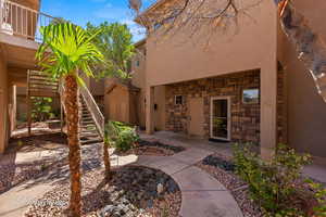 View of patio featuring stairs