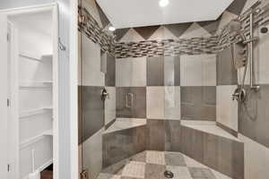 Master Bathroom with a dual shower
