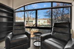 Master bedroom Sitting room featuring carpet floors