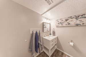 Vanity in basement bathroom.