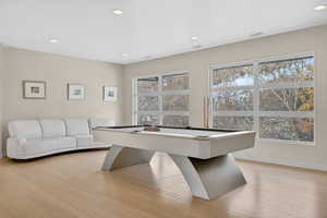 Rec room featuring pool table, recessed lighting, and light wood-style flooring