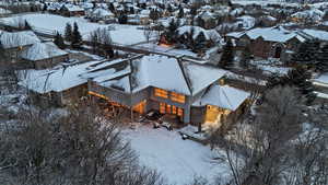 Snowy aerial view with a residential view