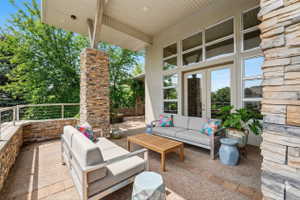 View of patio featuring outdoor seating and french doors