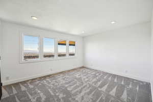 Basement bedroom, large closets, tons of natural light with west views of the city and sunset