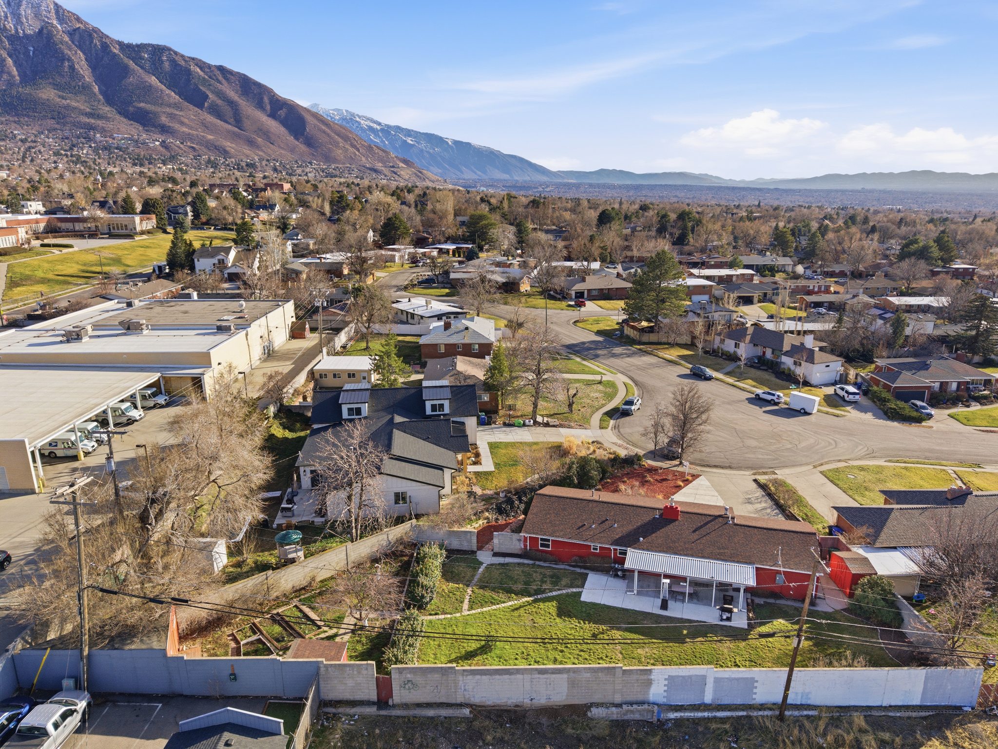 Aerial perspective of suburban area with mountains