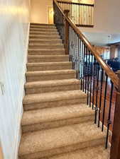 Staircase with wood finished floors