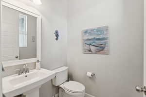 Bathroom featuring toilet and a sink