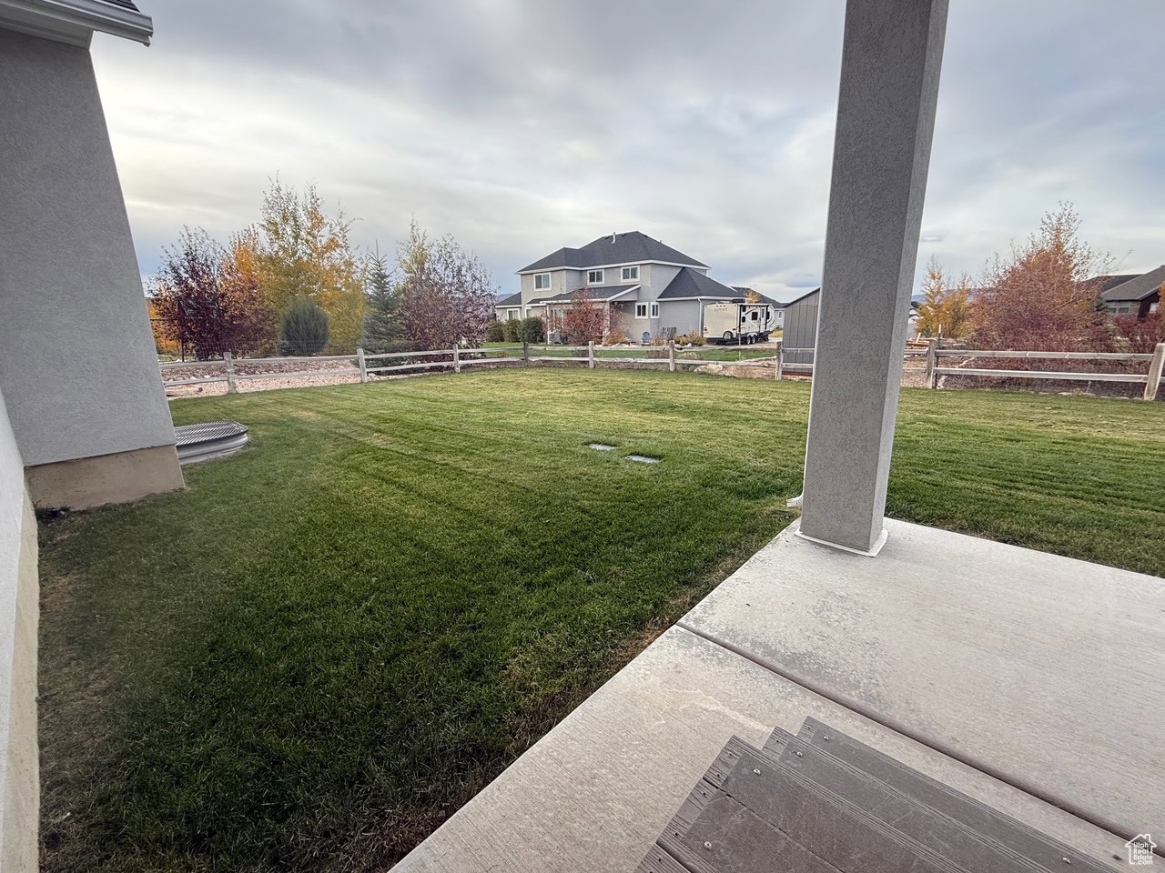 Fenced backyard featuring a patio area