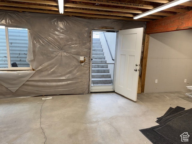 Below grade area featuring stairway