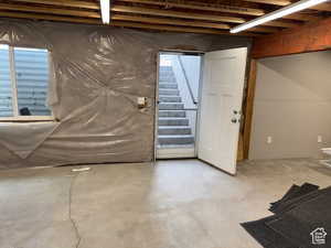 Below grade area featuring stairway