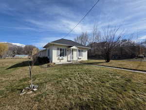 View of front of home featuring a mountain view